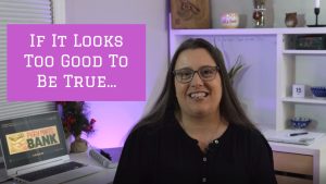 Image of a middle aged woman with brown hair in a black shirt sitting at a desk. The words "If it looks too good to be true..." are written on the screen in white letters on a pink background.